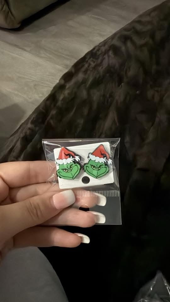 Green guy earrings